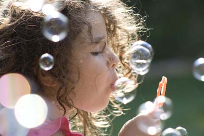 Children Playing With Bubbles